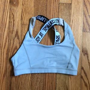 Tilyoucollapse sports bra